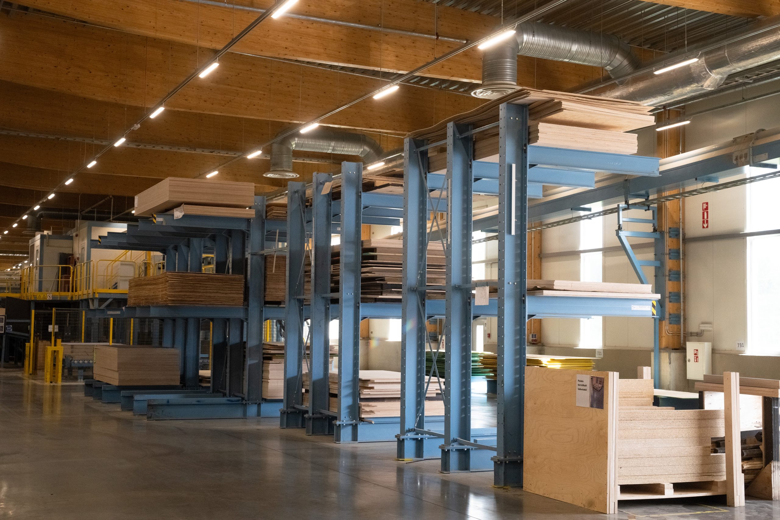 Plywood mill "Kohila Vineer" warehouse with stored plywood and veneer