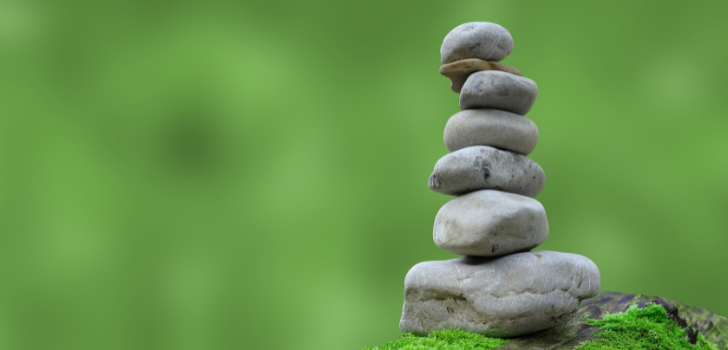 A tower built by stacking rocks one on top of the other