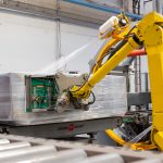 Cross Wrap packaging line operating at Latvijas Finieris to improve plywood packaging efficiency