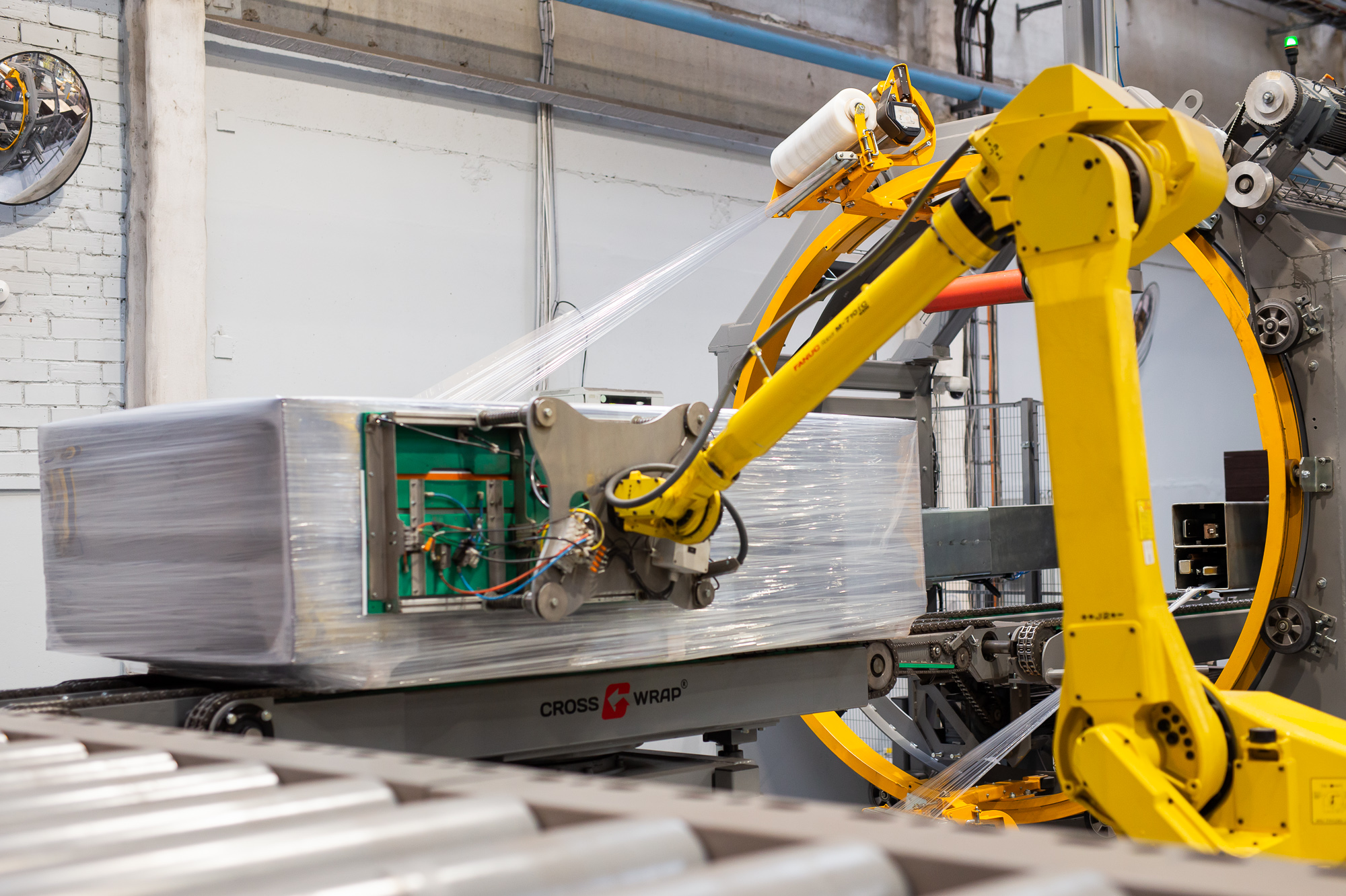 Cross Wrap packaging line operating at Latvijas Finieris to improve plywood packaging efficiency